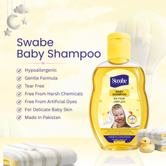 A bottle of Swabe Baby Shampoo displayed on a light cream background with promotional text, folded white towels, and a small yellow rubber duck. The bottle is transparent with yellow liquid inside and a yellow cap, featuring the Swabe brand logo and baby imagery on the label.