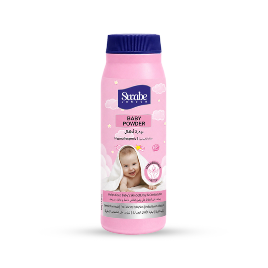A bottle of swabe Natural Baby Powder in pink packaging with a dark blue cap, featuring a cartoon baby illustration on the front label.