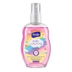 A 100ml bottle of Swabe London Baby Cologne Hypoallergenic Infant Spray, featuring a pink liquid inside a clear bottle with a white spray nozzle and a colorful pastel label.